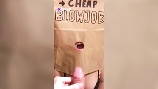 A guy is sucking air from his cock-packed paper bag. Ain't no fucking gloryhole, but it's a dick in a bag joke worth a laugh. - @theclassyone's Sex Reel