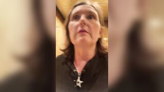 Desperate MILF rushes back to hotel to do HUGE piss in a plastic cup! After filling it once, she strips naked to finish it off