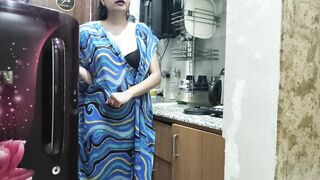 Indian stepmom watches and enters her stepson's Kitchen to fuck him.