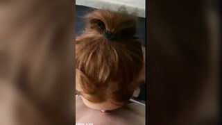Redhead sucks to a messy facial in POV