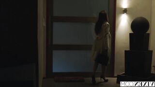 Janice Griffith and Ivy Wolfe covertly enter the garden intending to enjoy some late-night swimming.