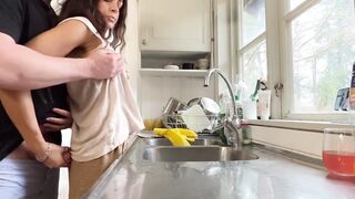 I was doing the dishes but my horny husband didn't let me finish and fucked me from behind in the kitchen