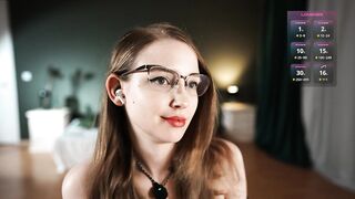 Beatiful Girl In Stockings Wearing Cute Glasses